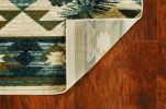 9' X 12' Ivory Blue Machine Woven Geometric Lodge Indoor Area Rug