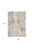 7' X 10' Beige And Ivory Abstract Area Rug