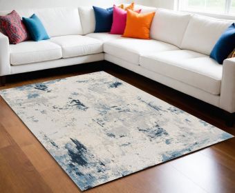 7' X 10' Blue And Ivory Abstract Strokes Area Rug