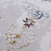 4' X 6' Gray And Beige Distressed Ornate Area Rug