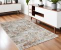 4' X 6' Gray And Beige Distressed Ornate Area Rug